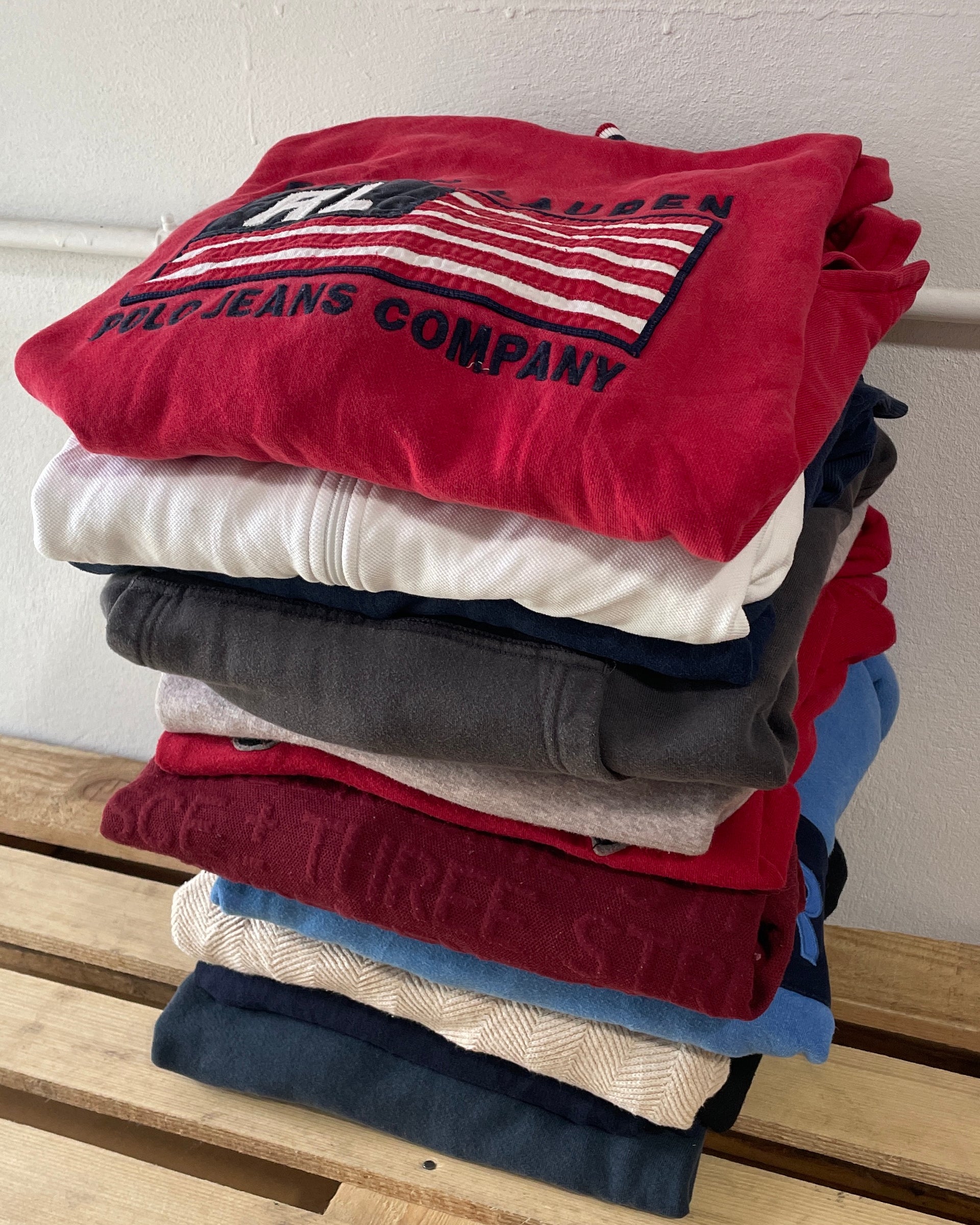 Brand Name Sweatshirts on table