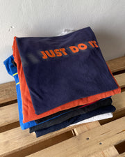 Brand Name T-Shirts on table