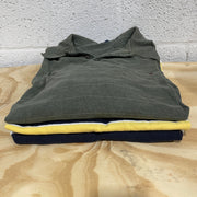 Brand Name Polo Shirts on table